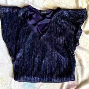 It is a party shirt the color is navy blue